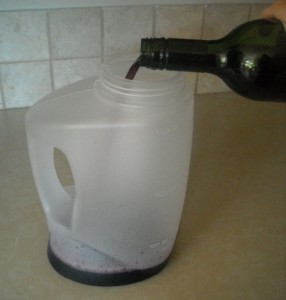 pour wine into pitcher